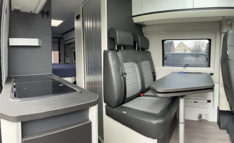 Fiat Adria 640 bus camper with large garage and fold-down bed 