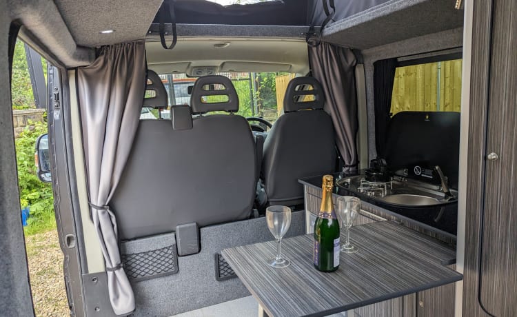 fully comp insurance included –  4 berth pop top  Peugeot campervan with wind out flamma awning