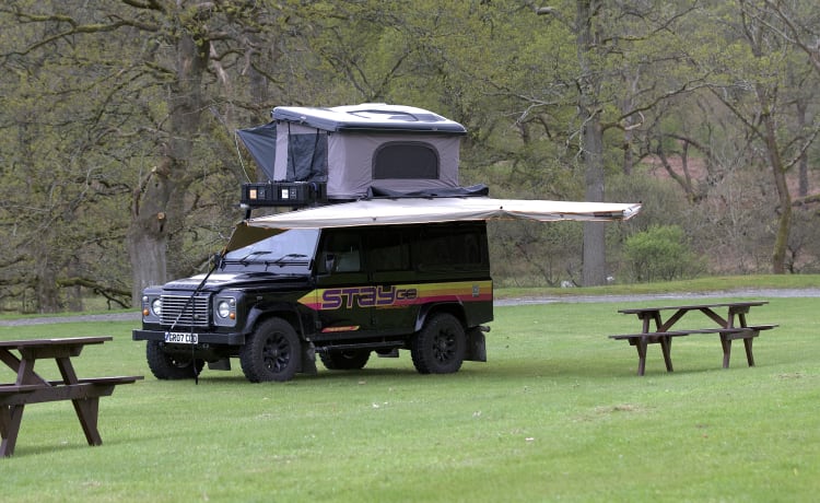 The Sheriff – Land Rover Defender Overland Adventure Camper avec auvent 270