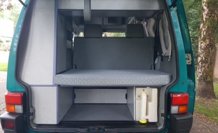 Été -VW T4 California avec toit de couchage fixe