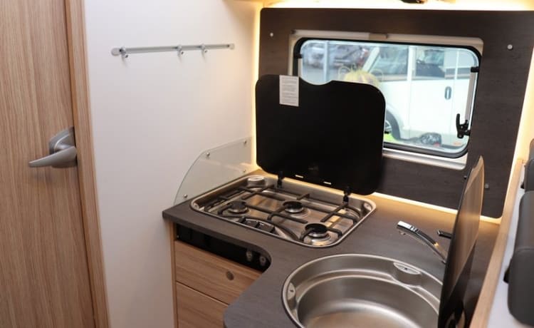 T69L – Complete HomeCar family camper with motor air conditioning and awning,