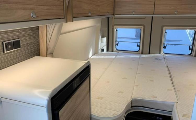 Jo'Berg – Camper autobus Hymer Yellowstone (con tetto sollevabile) del 2019