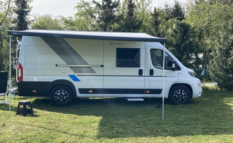 Sunliving Bus camper with bus biker