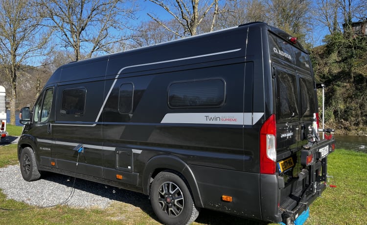 Fiat Adria 640 bus camper with large garage and fold-down bed 