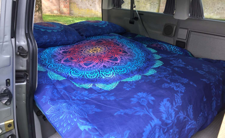 Mandala - Multivan VW T4 confortable et robuste avec toit relevable