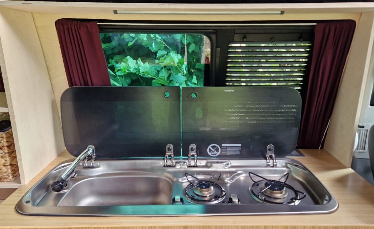 Self-built VW T5 camper for 2 people