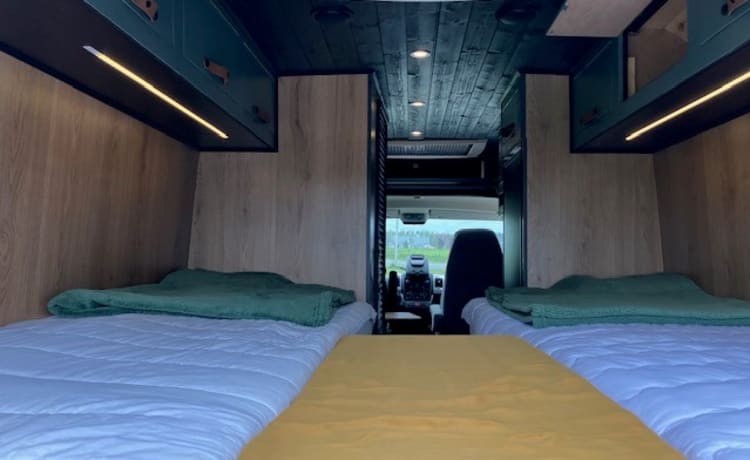 Heunie 1 – Beau camping-car bus avec 2 lits longitudinaux