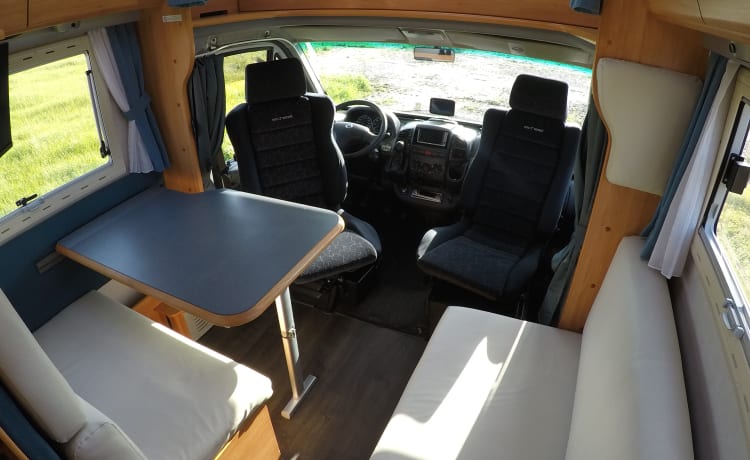 5 person Adria Mobil alcove camper > (electric) bicycles in garage