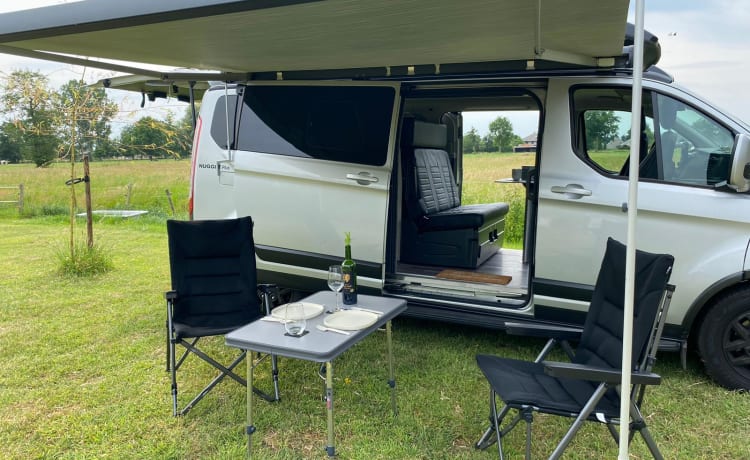 The Nugg – Ford Nugget Plus Trail 2023 - Full option camperbusje met hefdak en toilet