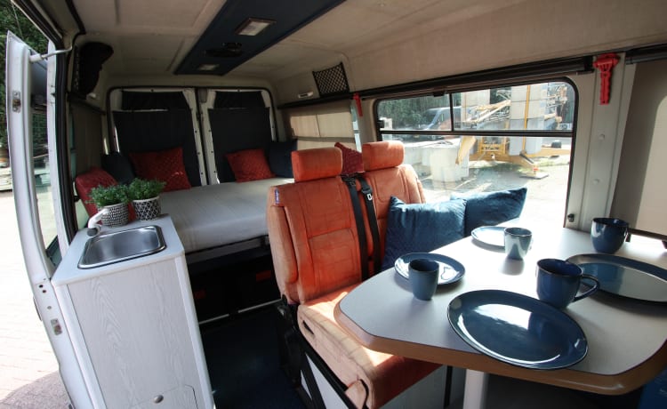 Neat 4 pers. Fiat Ducato bus camper (spacious fixed bed); 2.8 TD with pit