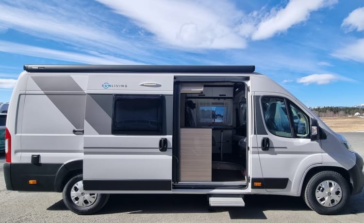 Gloednieuwe campervan met TentTop