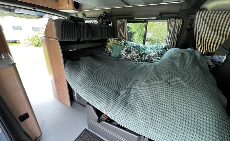 Super practical four-person Ford camper van