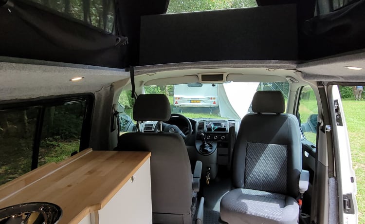 4-person Volkswagen with pop-up roof and long wheelbase for extra space