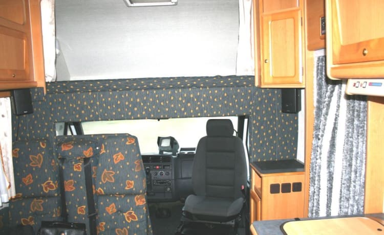 Nice family camper with sleeping places for 4 people.