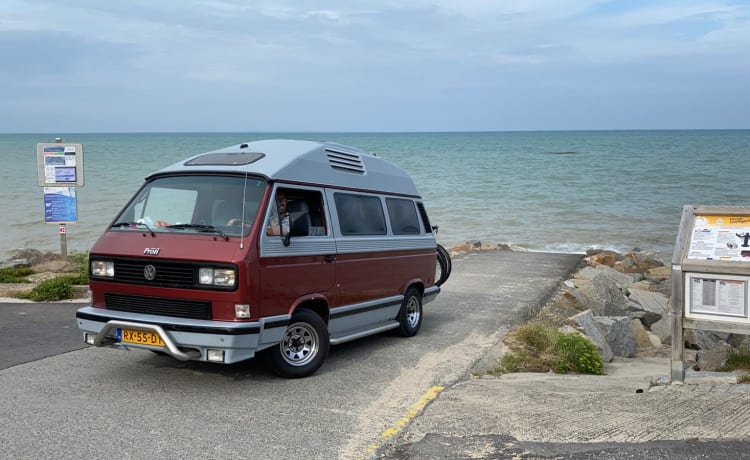 Original retro Volkswagen T3 Dehler with complete camping equipment.