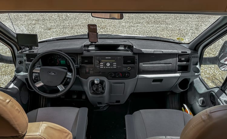 Ford Challenger semi-integrated camper with solar panels!