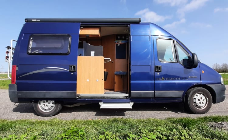 Compact yet spacious factory camper with cozy round seat and winter tires