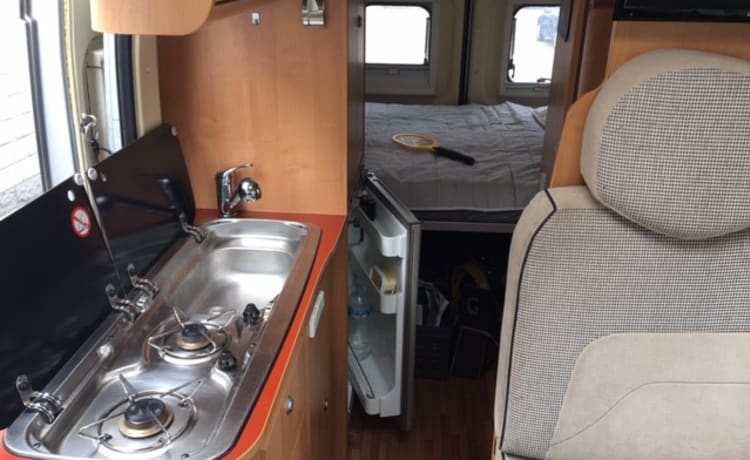 2 person bus camper with fixed bed and sanitary facilities