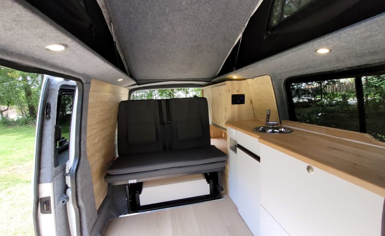 4-person Volkswagen with pop-up roof and long wheelbase for extra space