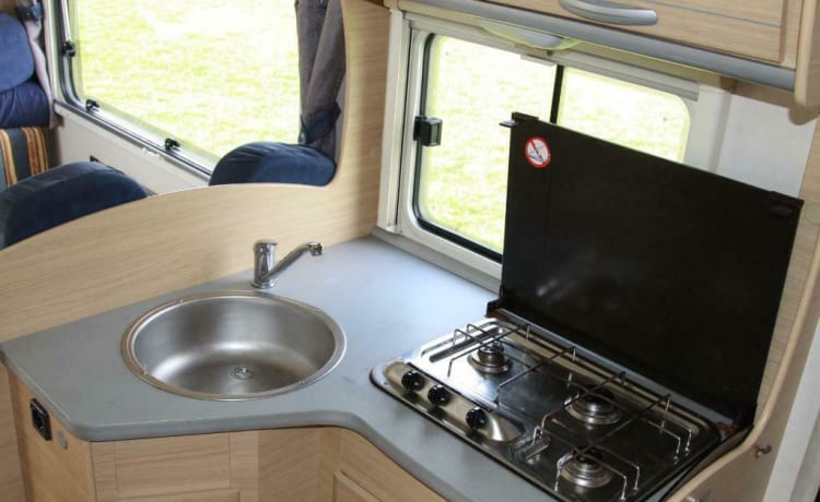 Spacious furnished family camper with bunk beds and air conditioning