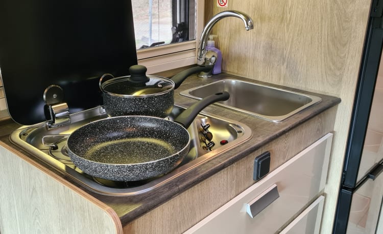 Dolly – Luxury camper with plenty of storage space.