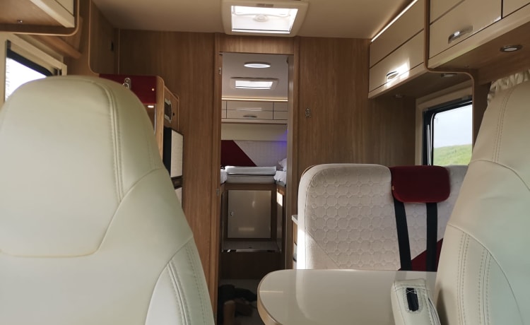 -person luxury, spacious, neat Alcove family camper Rimor from 2019