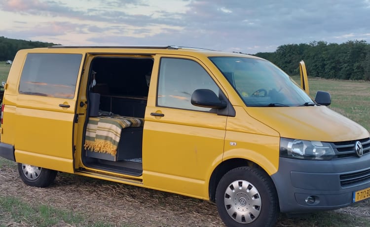 VW T5 yellow bus with modern interior