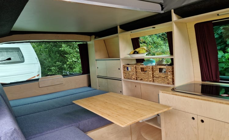 Self-built VW T5 camper for 2 people