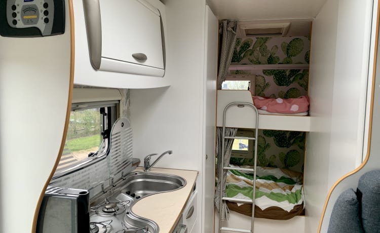 Modern trendy camper with bunk beds!