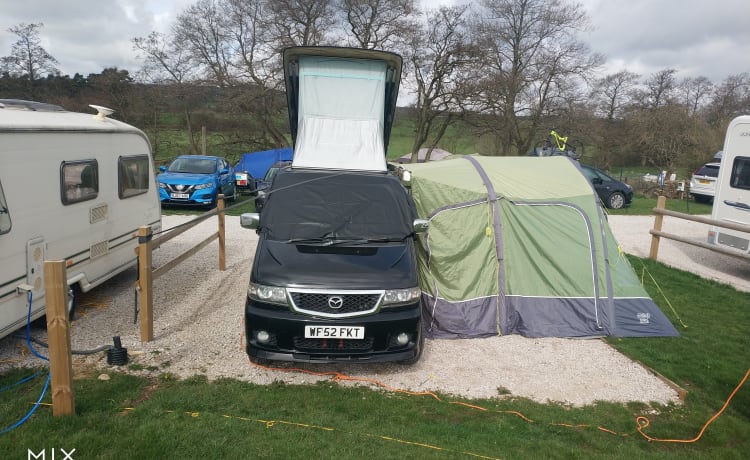 LOCATION DE CONVERSION DE GAZ BONGO AU BÉNÉFICE DANS LA TENTE ET LE PORTA L DE TOILETTES GRATUITES DE STAFFORD