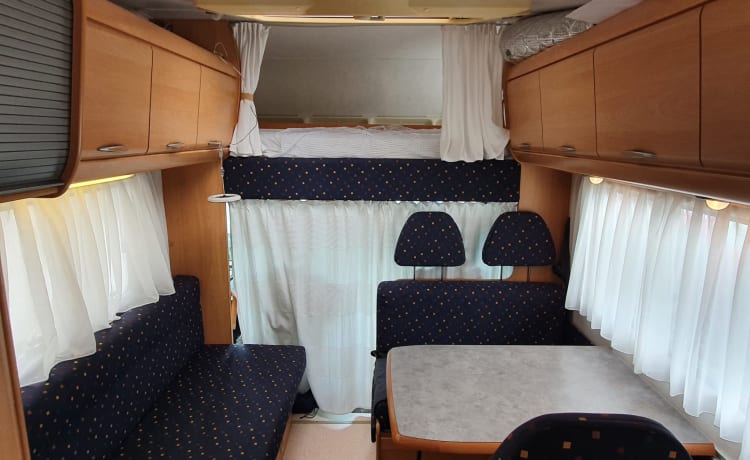 Bessie – Nice spacious alcove camper (winter tires)