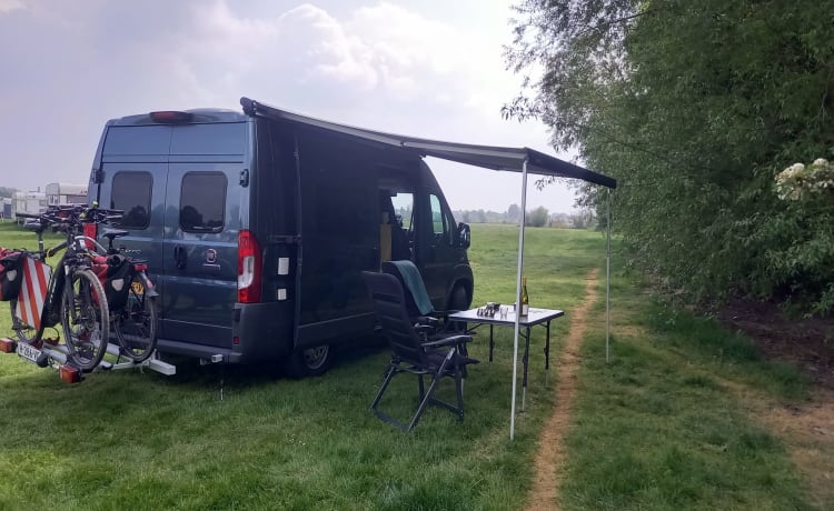 2p Fiat Ducato camper bus from 2016 with air conditioning and e-bike carrier