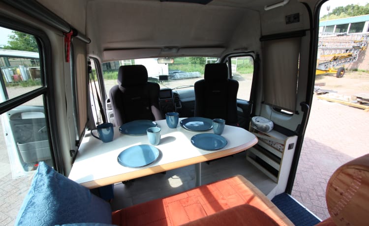 Neat 4 pers. Fiat Ducato bus camper (spacious fixed bed); 2.8 TD with pit