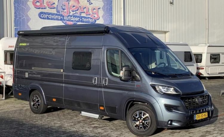 Jo'Berg – Camper autobus Hymer Yellowstone (con tetto sollevabile) del 2019