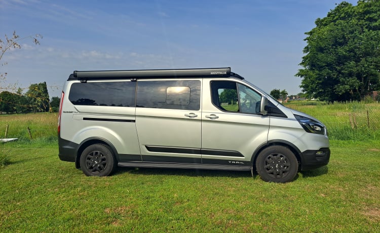 The Nugg – Ford Nugget Plus Trail 2023 - Full option camperbusje met hefdak en toilet