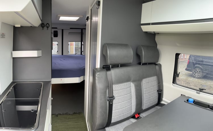 Fiat Adria 640 bus camper with large garage and fold-down bed 