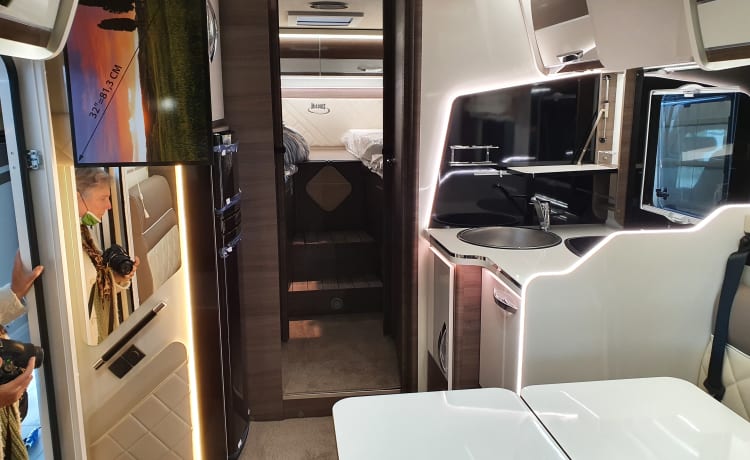 8 – luxury 4 person mclouis Carat 2022 with fixed bed in the back