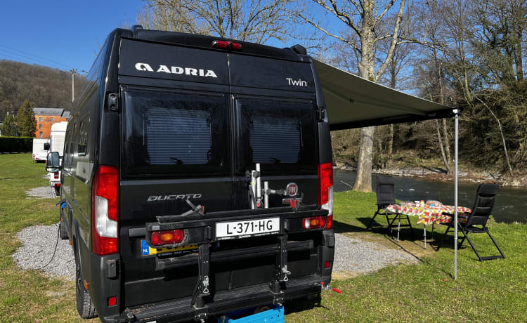 Fiat Adria 640 bus camper with large garage and fold-down bed 