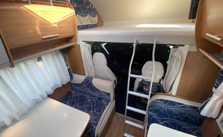 Cel4night – 7-seater overcab motorhome