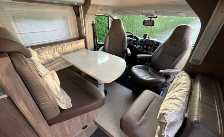 Bürstner/Fiat Ducato semi-integrated from 2016 with full leather upholstery.