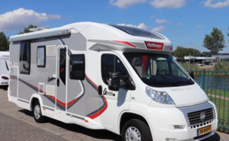 luxury camper for rent Challenger queen bed dish