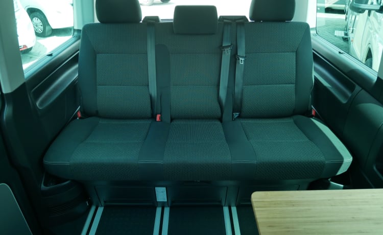 Volkswagen T6 Multivan 5 tot 7 zitplaatsen met slaaphefdak!