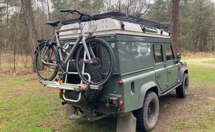 Land Rover Defender kampeerauto met hefdak, 2 personen