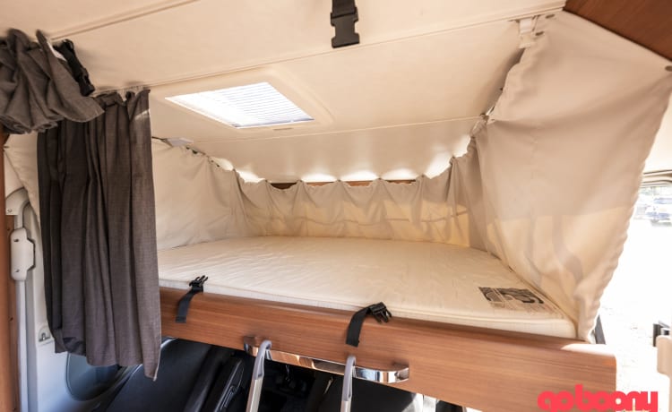 LMC Integral Camper with round seating layout