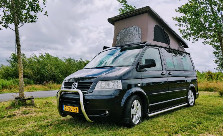 Zwarte 2.5 TDI Multivan T5 Highline Camperbus