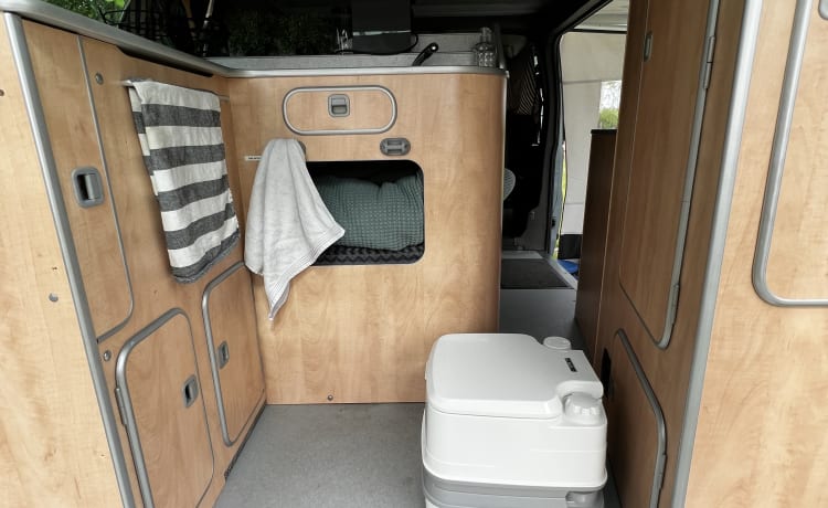 Super practical four-person Ford camper van