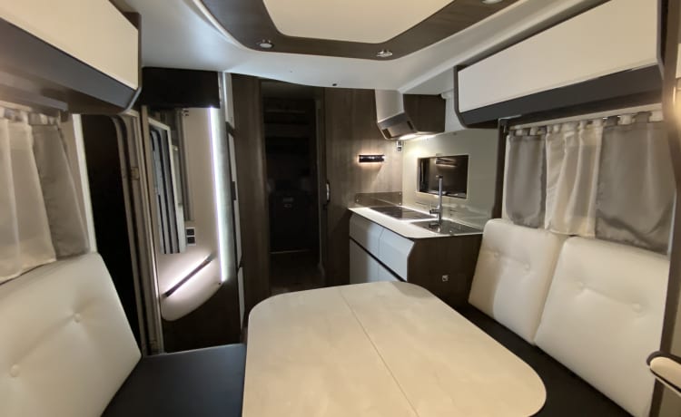 Very modern Benimar Ducato Camper with every luxury.