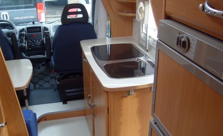 Experience Freedom and Comfort with this richly equipped Camper