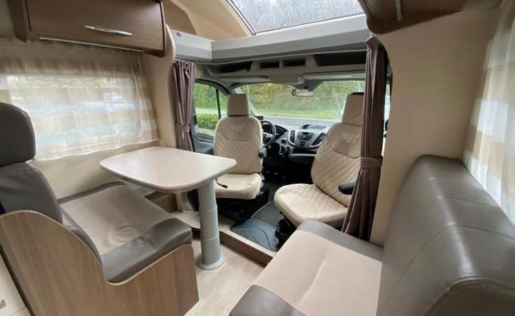 5p Burstner 726 Plus with single beds and electric fold-down bed