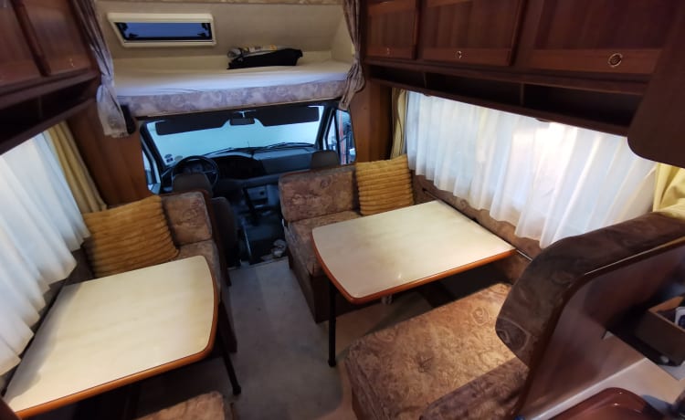 Spacious 6 person Rimor camper fully equipped.